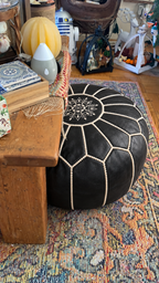 red pouf ottoman